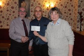 President Dave Parsons, Representative Deb Brownlee and Nominee John Mobley of chair, St John's church preservation group