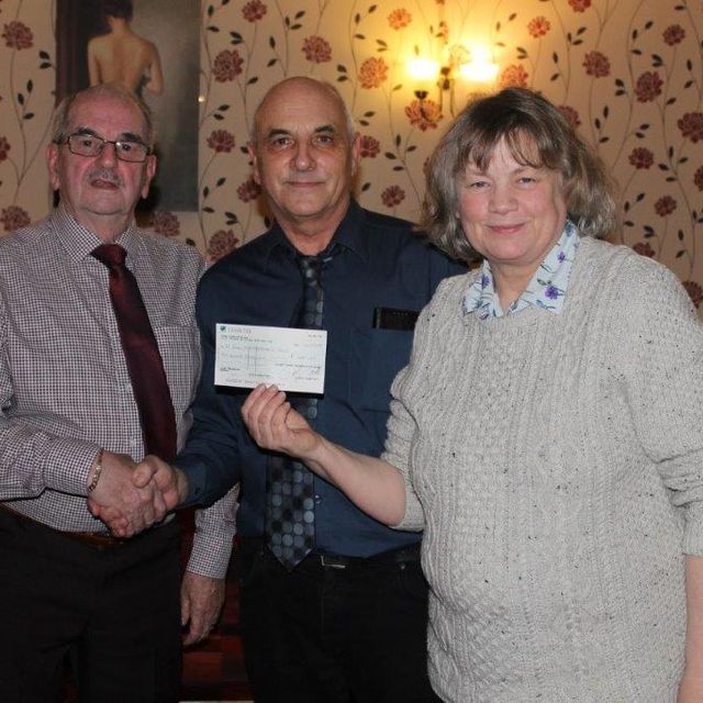 President Dave Parsons, Representative Deb Brownlee and Nominee John Mobley of chair, St John's church preservation group